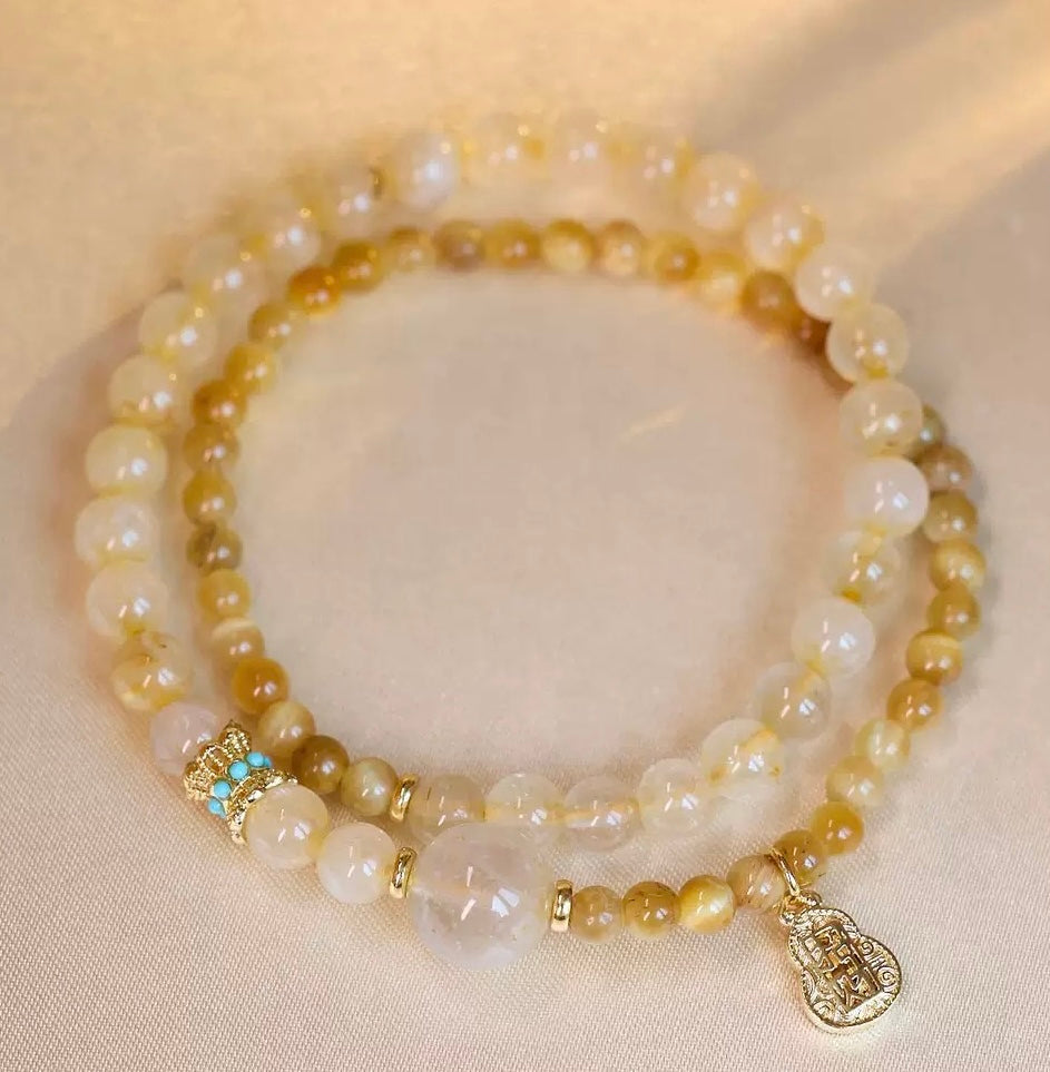 天然水晶发财金发晶手串